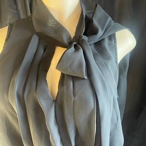 Elegant black Sleeveless Blouse with Bow